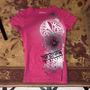 Pink black and white shirt, quality: lightly used and great! Fits small-medium